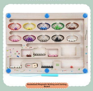Close-up of magnetic bead maze board showing basketball theme and math sorting game