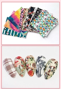 Detail showing colorful tie-dye and floral nail stickers with real application effects