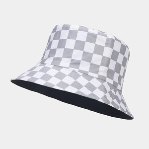 Detailed close-up showing the checkered pattern and double-layered fabric of the bucket hat