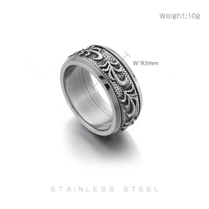 Macro view of vintage engraved patterns on 9.5mm wide silver stainless steel ring