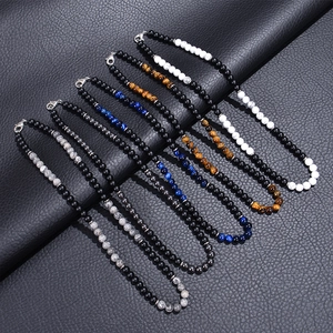 Multiple 6mm natural map stone and matte beaded necklaces set on black leather
