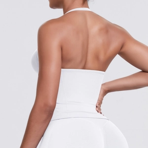 Close-up of white high-intensity racerback sports bra with breathable textured fabric