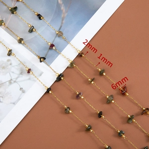 Detail of 2mm colorful natural stones on 1mm gold stainless steel chain with 6mm spacing