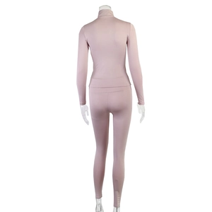 Close-up of high-elasticity mauve yoga set showing back stitching and contouring