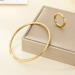 Minimalist 304 stainless steel golden jewelry set with round ring and smooth bangle