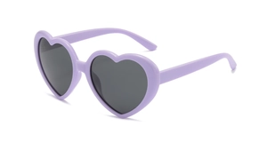 Detail of trendy purple heart-shaped sunglasses with dark UV protection lenses