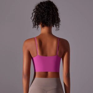 Women's rose pink high-stretch sports bra with thin straps and racerback design