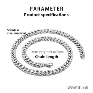 Macro detail of 8mm silver stainless steel Cuban link chain necklace with lobster clasp
