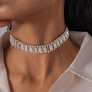 Detail of luxury geometric choker featuring rectangular crystals and pavé settings