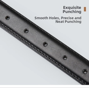 Detail of lychee pattern black leather belt showing stitching and smooth circular holes