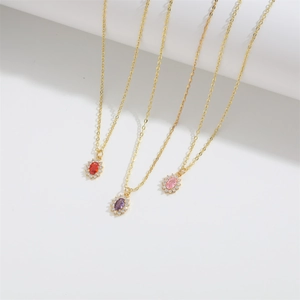 Elegant gold necklaces with colorful oval zircon pendants in red, purple, and pink hues