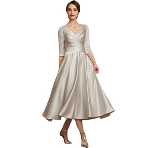 Elegant champagne satin V-neck evening gown with mid-sleeves and pleated A-line silhouette