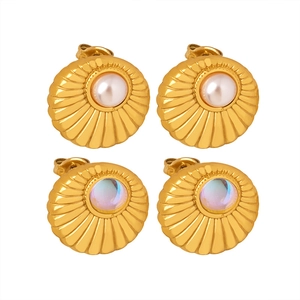 Vintage shell-patterned gold earrings with pearl and iridescent gemstone accents