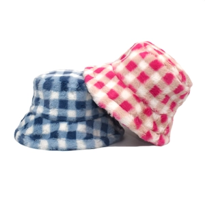 Winter plush checkerboard bucket hats in blue-white and red-brown plaid patterns