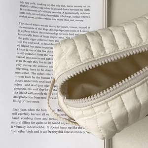 Quilted cherry cosmetic bag in cream white with zipper and portable hand strap