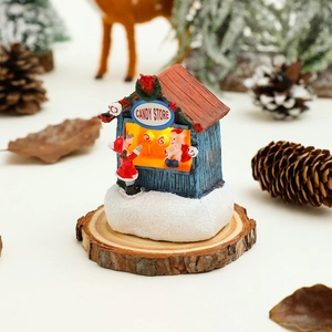 Miniature de confiserie de Noël lumineuse en résine sur socle bois avec décor hivernal