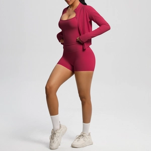 Three-piece rose red yoga set including cropped zip jacket, vest and high-waisted gym shorts