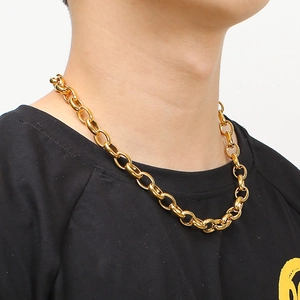 Close-up of hip-hop vacuum plated gold square pearl necklace on model's neck
