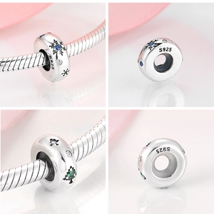 Detail of S925 sterling silver beads with snowflake patterns and inlaid cubic zirconia