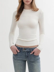 Close-up of premium white long-sleeved tight t-shirt showing detailed fabric texture