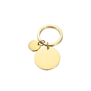 Detailed view of polished gold stainless steel keychains with blank round charms for laser engraving