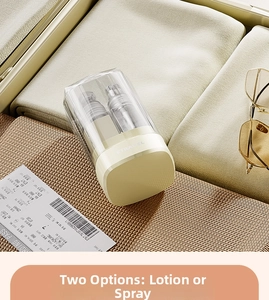 Portable travel set with spray and lotion bottles inside a beige suitcase with sunglasses