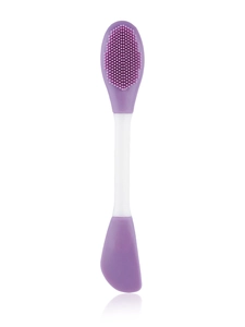 Detailed macro of dual-headed purple silicone face cleansing brush and mask applicator tool