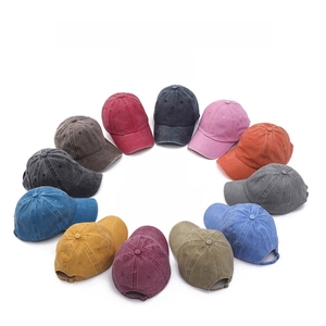 Detailed view of washed cotton vintage baseball caps in various colors for family matching