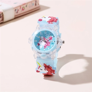 Macro view of light blue children watch featuring 3D unicorn design and transparent casing