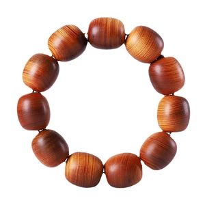 Aged cypress wood prayer beads with natural wood grain pattern in brownish-red finish