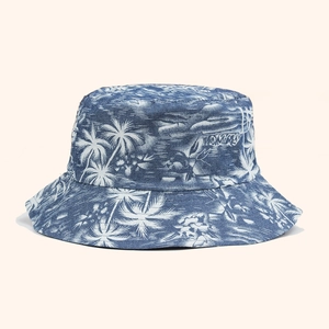 Reversible bucket hat with blue tropical palm tree print and embroidery for women