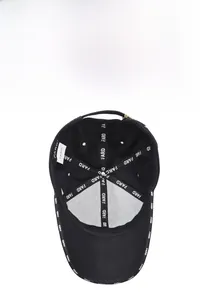 Detail view of the black baseball cap interior featuring breathable fabric and FARD branding