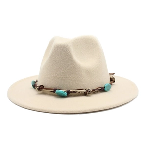 Detailed view of bohemian braided band with turquoise stones on wool felt fedora hat