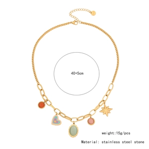 Detailed shot of stainless steel Cuban chain necklace with colorful heart and eye pendants