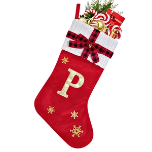 Detail of red Christmas stocking featuring gold embroidered letter P and snowflake sequins