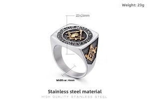 Macro detail of Freemasonry skull ring in gold and silver stainless steel with engraving