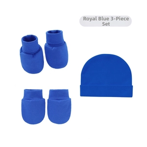 Detail of royal blue 3-piece newborn set including hat, mittens, and booties