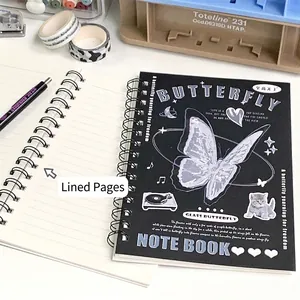 Black spiral A5 notebook featuring silver butterfly and cat prints with lined inner pages