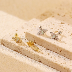 Detailed macro view of S925 silver opal stud earrings with screw back design