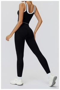 Detailed back view of high-waist yoga leggings and contrast strap sports bra set