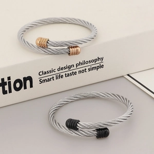 Classic stainless steel cable cuff bracelets with rose gold and black metal accents