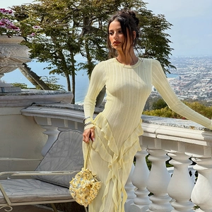 Slim fit light yellow ribbed knit long dress with asymmetric ruffle hem for autumn style