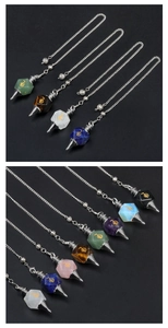 Detailed macro view of faceted crystal Cho Ku Rei power symbol pendants in various colors