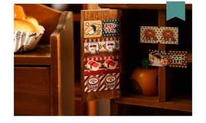 Macro view of Japanese food miniature stickers on a dollhouse wooden cabinet