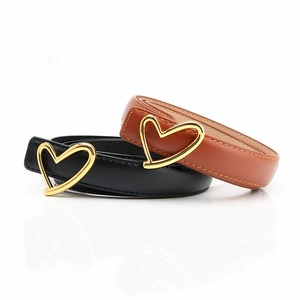 Chic women's thin leather belt featuring a large gold heart-shaped metal buckle design