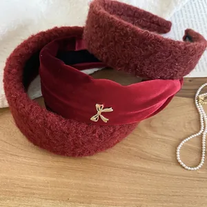 Elegant retro red plush and velvet headband set with golden bow accents for women