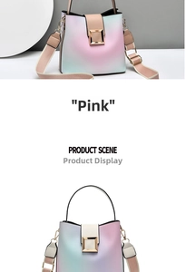 Detail of gradient pink bucket bag with wide shoulder strap and gold metal buckle