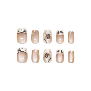 Exquisite handmade press-on nails featuring bamboo leaf patterns and French cat-eye finish