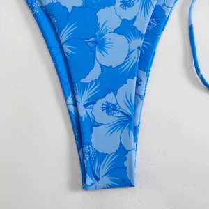 Blue hibiscus print bikini bottom featuring tropical flowers and high-elastic fabric