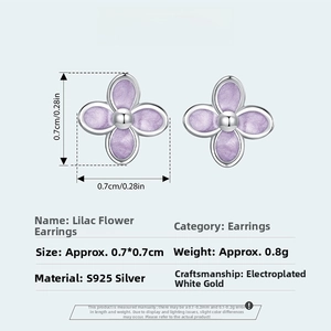 Macro detail of S925 silver lilac flower stud earrings with purple enamel petals
